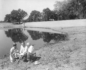 Directors and Cooperator visit stock water and irrigation reservoir holding 45 acre feet of water, with a 40 acre adjoining wildlife habitat area. July, 1959